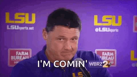 Man Talking Into Microphone Saying I'm Comin