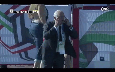 Man Talking On Cell Phone Near Sign Ple 0-1 Aus GIF