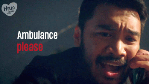 Man Talking On Cell Phone Saying Ambulance Please GIF