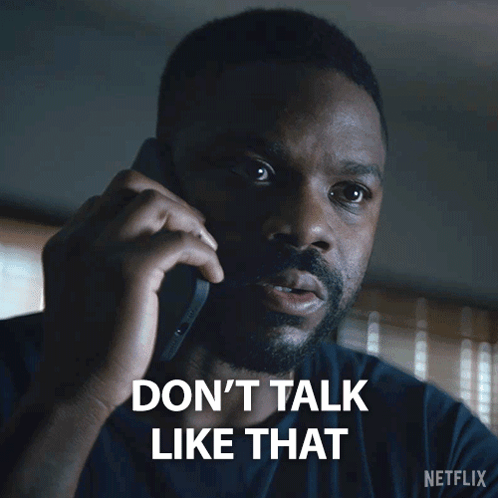 Man Talking on Cell Phone Saying Don't Talk Like That