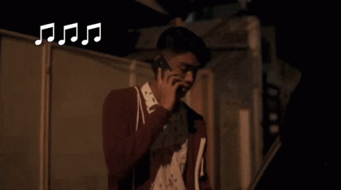 Man Talking On Cell Phone Saying Good Luck Brucie GIF