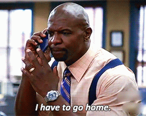 Man Talking on Cell Phone Saying I Have to Go Home