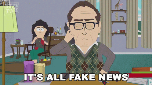 Man Talking on Cell Phone Saying It's All Fake News