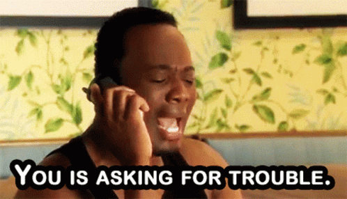 Man Talking On Cell Phone Saying You Is Asking For Trouble GIF