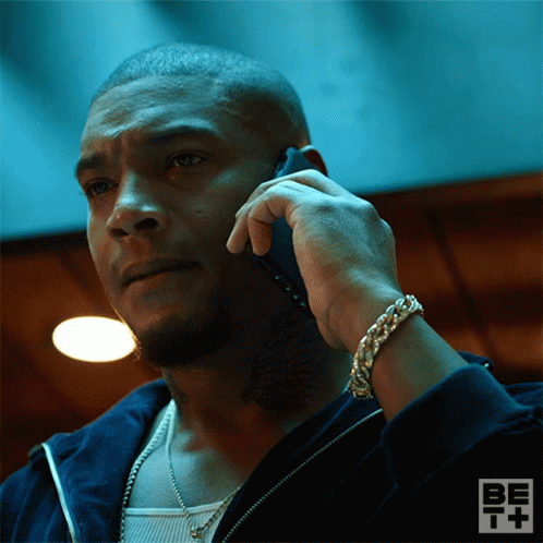 Man Talking on Cell Phone with Bet+ Logo