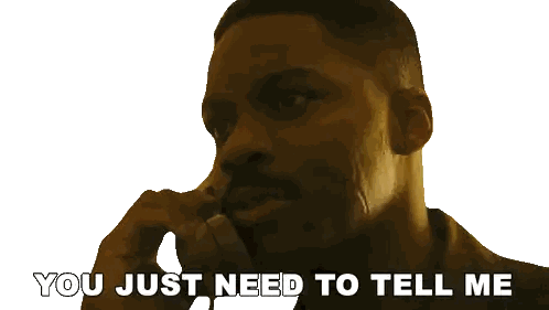 Man Talking on Phone Saying You Just Need to Tell Me