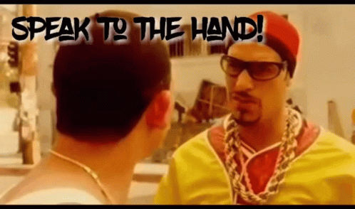 Man Talking to Another Man With Speak to the Hand