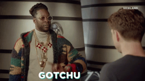 Man Talking to Another with Gotchu