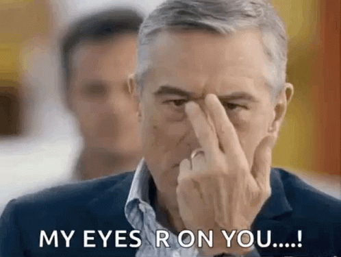 Man Tapping Forehead My Eyes Are On You GIF