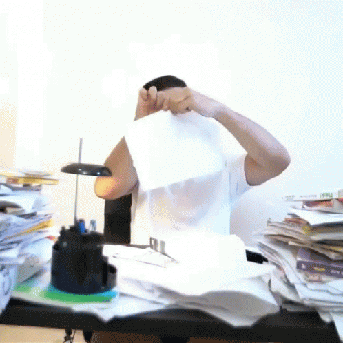 Man Tearing Paper GIF