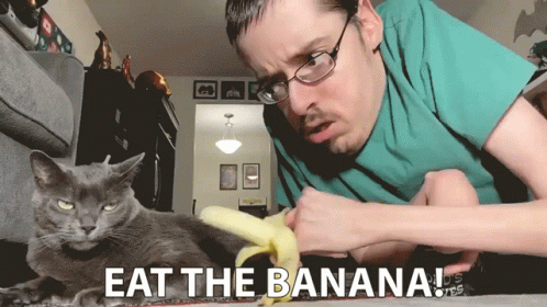 Man Teasing Banana Cat Meme GIF