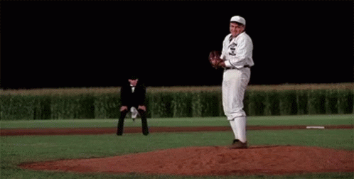 Man Throwing Baseball As Referee Watches GIF