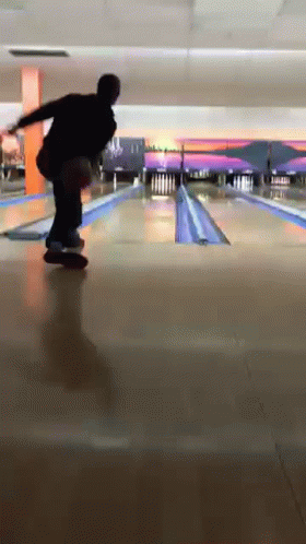 Man Throwing Bowling Ball