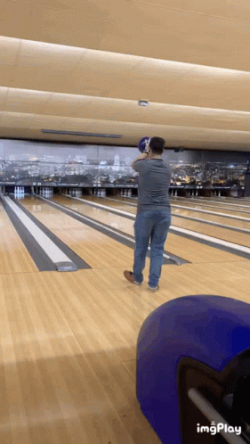 Man Throwing Bowling Ball With Imgplay Logo