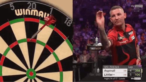 Man Throwing Dart at Winmau Dartboard