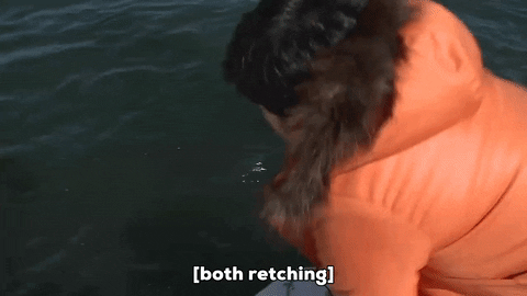 Man Throwing Up On Boat GIF