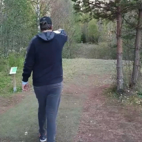 Man Throws Frisbee With Force GIF