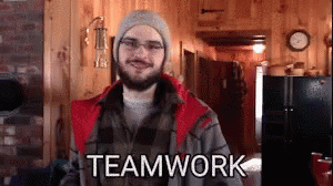 Man Touching Hands Saying Team Work GIF