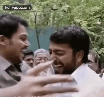 Man Touching Other Man's Nose GIF