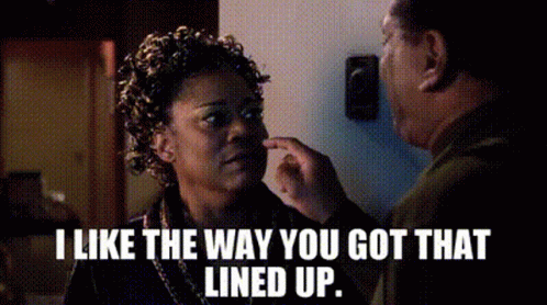 Man Touching Woman's Face Saying I Like The Way You Got That Lined Up GIF