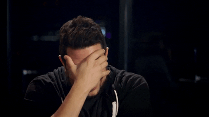 Man Trying Not To Laugh GIF