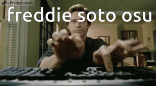 Man Typing Freddie Soto OSU on Screen