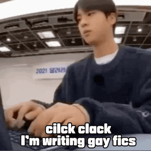 Man Typing On Laptop At Desk GIF