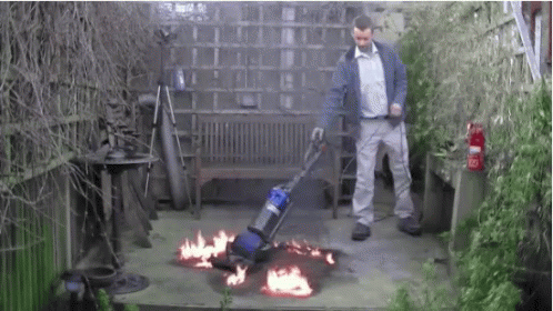 Man Vacuum Cleaner On Fire GIF