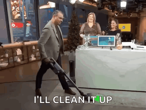 Man Vacuuming Saying I'll Clean It Up