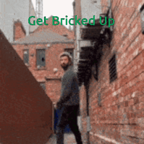 Man Walking Down Alleyway Saying Get Bricked Up