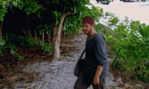 Man Walking Down Dirt Path With BBC