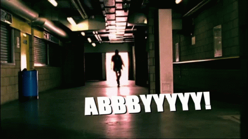 Man Walking Down Hallway With Abbbbyyyy GIF