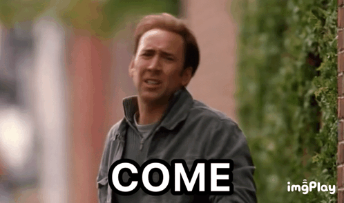 Man Walking Down Street Saying Come