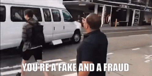 Man Walking Down Street Youre Fake And Fraud GIF