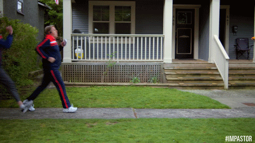 Man Walking Fast Trying To Outrun Woman GIF