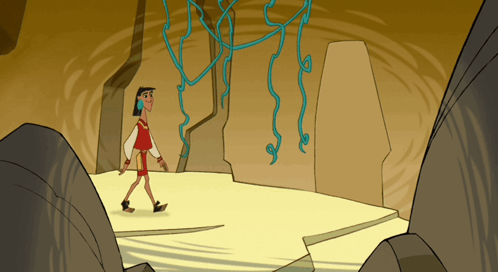 Man Walking in Cave with Vines