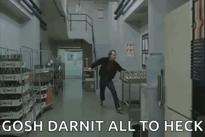 Man Walking in Kitchen Hallway