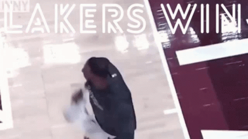 Man Walking Lakers Win GIF