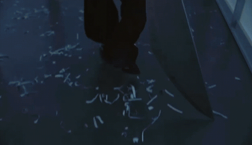 Man Walking Past No Exit Sign