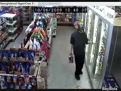 Man Walking Through Store 10/06/2009