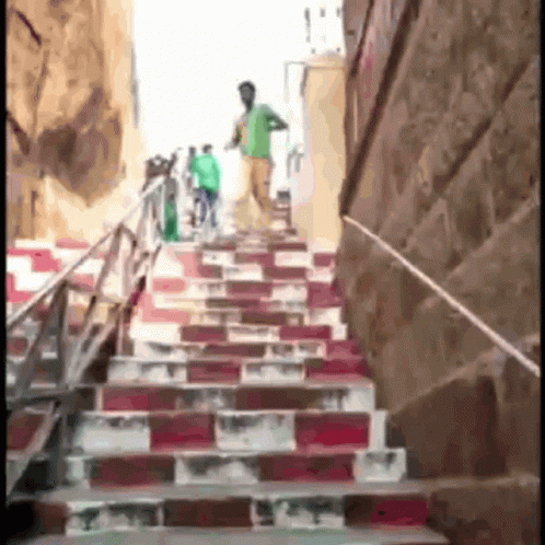 Man Walking Up Stairs
