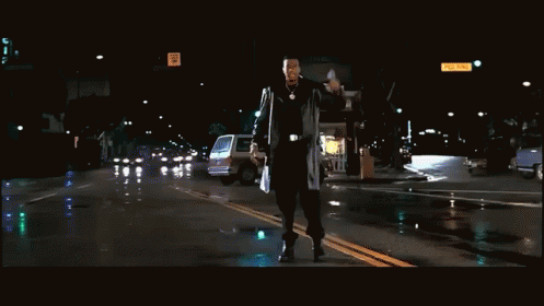 Man Walking with Freeway Sign