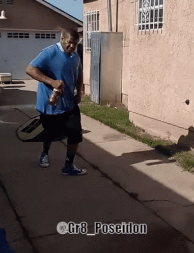 Man Walking with @ Gr8 Poseidon