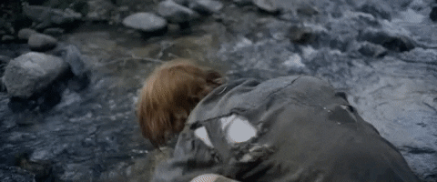 Man Washing Face On River GIF