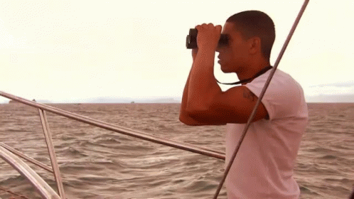 Man Watching The Sea With Binoculars GIF
