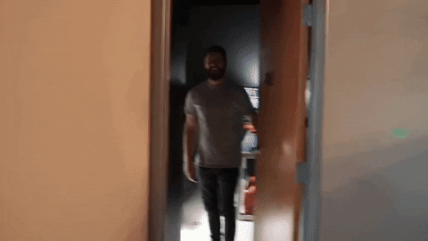 Man Wave K Bye And Close Door GIF