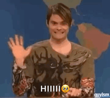 Man Waving in Front of World Map