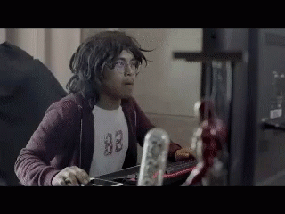 Man Wearing 88 Shirt Playing Video Game GIF