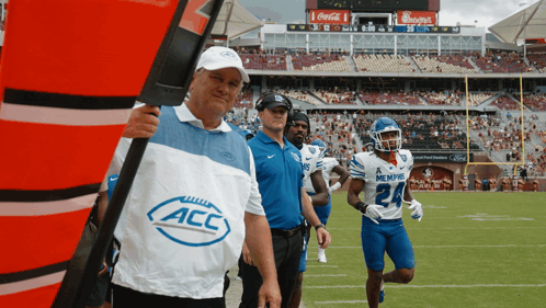 Man Wearing ACC Shirt