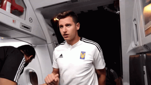 Man Wearing Adidas White Shirt